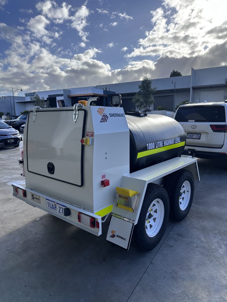 Shermac MTS1000 wash down trailer rear pump housing and emergency stop at WA delivery yard