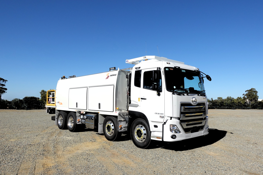 Eight rear wheels, white enclosed body, Shermac 8x4 mine-spec service truck ready for delivery