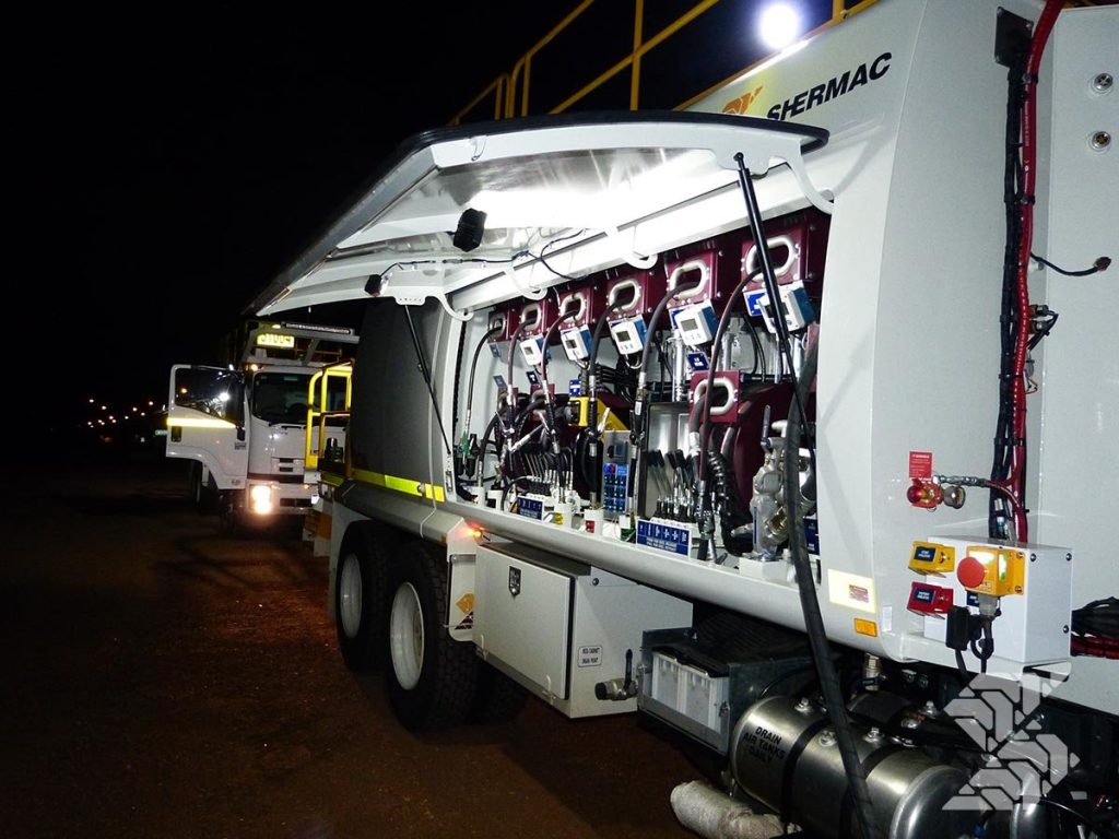 Mine-spec Shermac service truck with integrated filtration and fluid dispensing systems supporting clean fuel and oil transfer in mining operations.