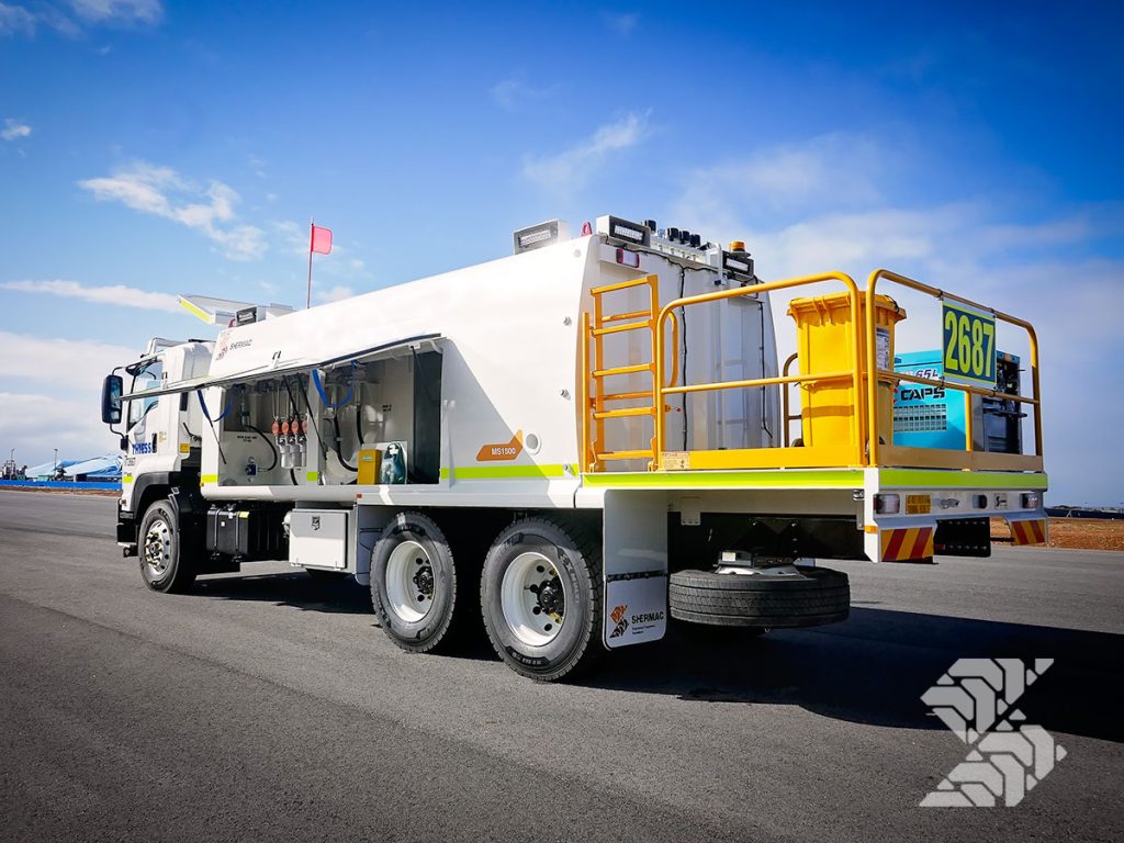 Shermac MS1500 mine-spec service truck with safety rails, compliant access platform, and integrated fluid servicing systems operating on an Australian mine site.