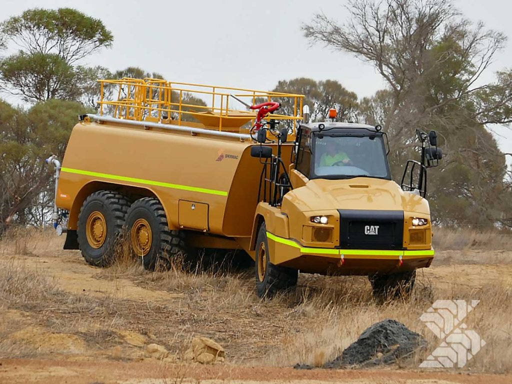 Articulated off-road water cart operating on uneven terrain, showing flexible chassis design, mid-capacity tank and site-ready dust suppression setup.