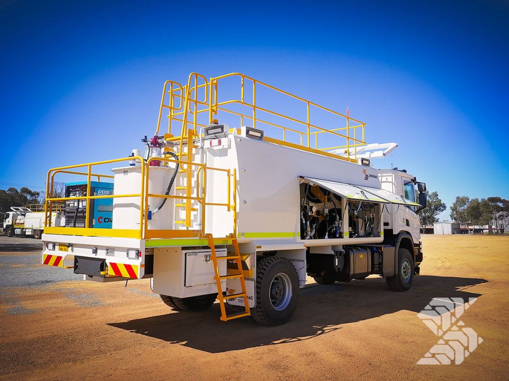 Mine-spec service truck with elevated platform, safety rails and ergonomic access system designed for efficient on-site maintenance operations