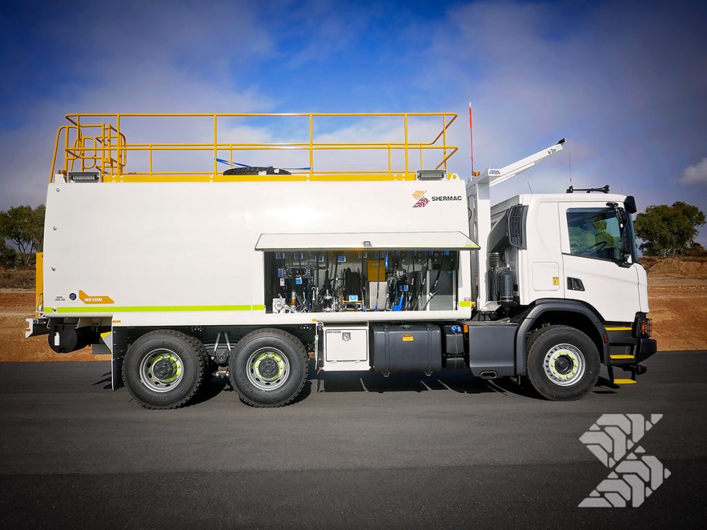 Shermac service truck with lightweight aluminium service door open for easy equipment access.